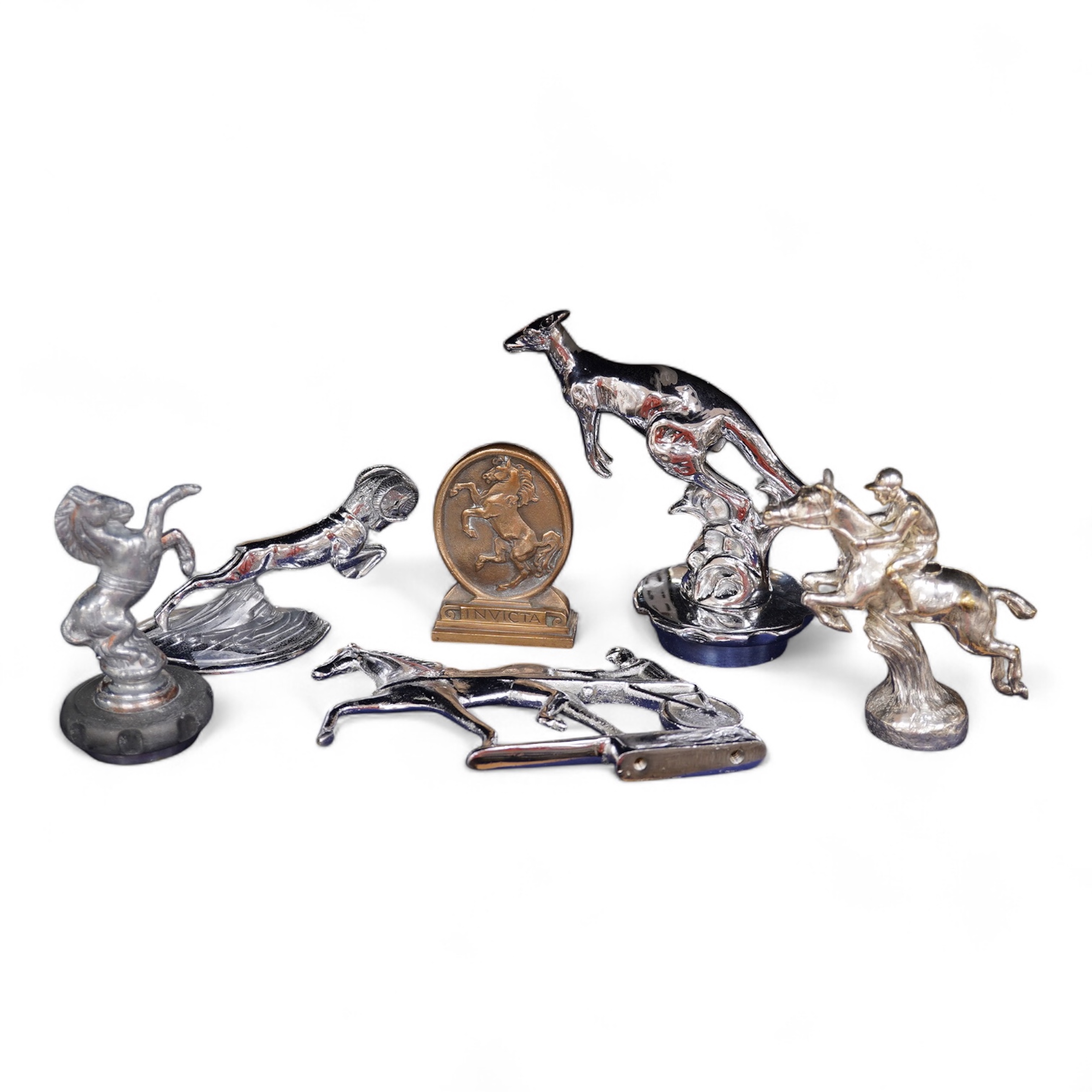 Seven brass and chrome animal related car mascots including; four horse related mascots, two Kangaroo mascots mounted on radiator caps and a leaping ram by Jarvis (no.1027). Condition - fair to good, some losses to chrom